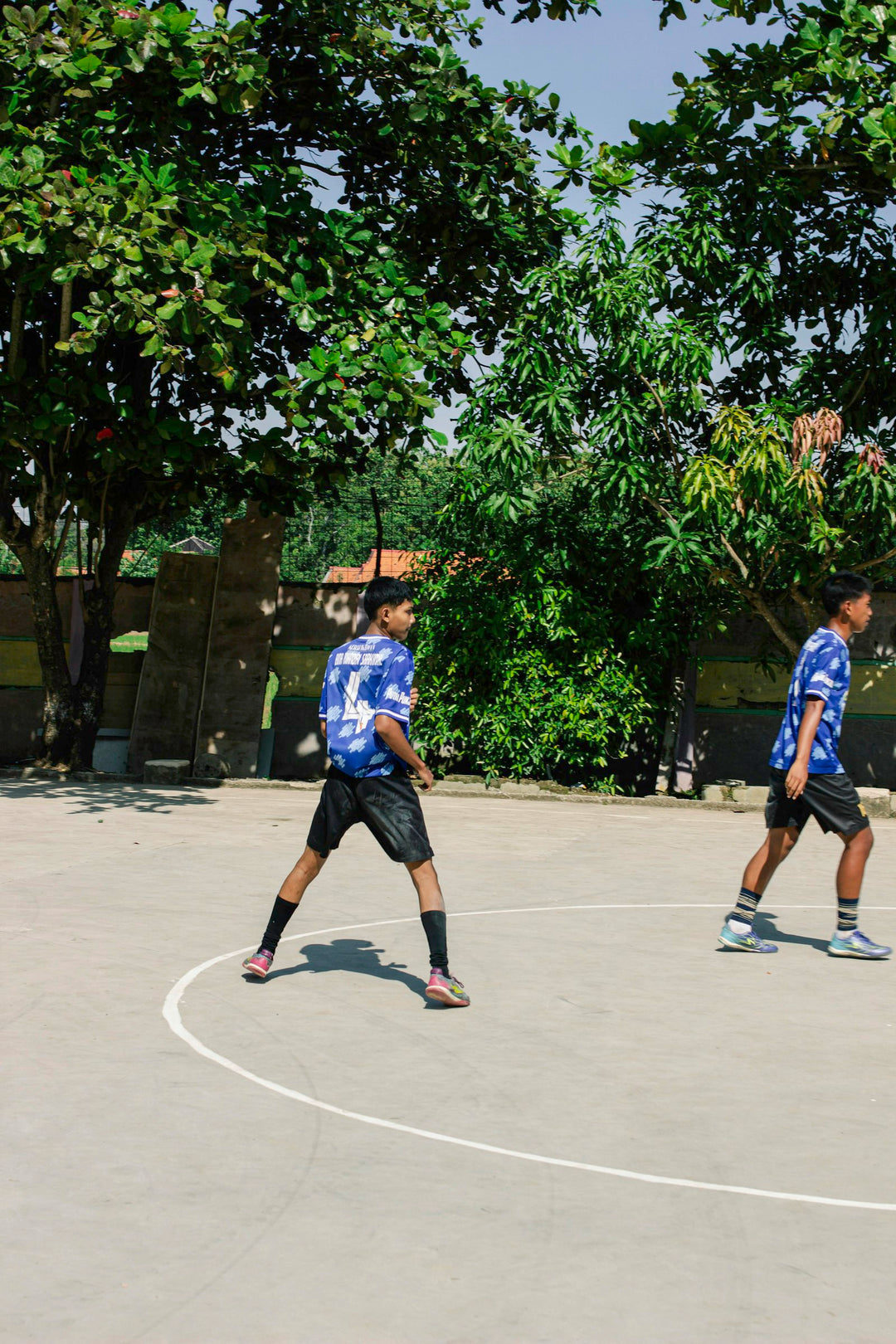 Kids in team sports shirts